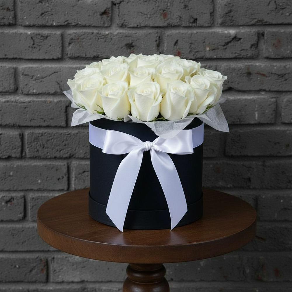 Цветочная композиция из Розы в шляпной коробке в Усть-Ишиме